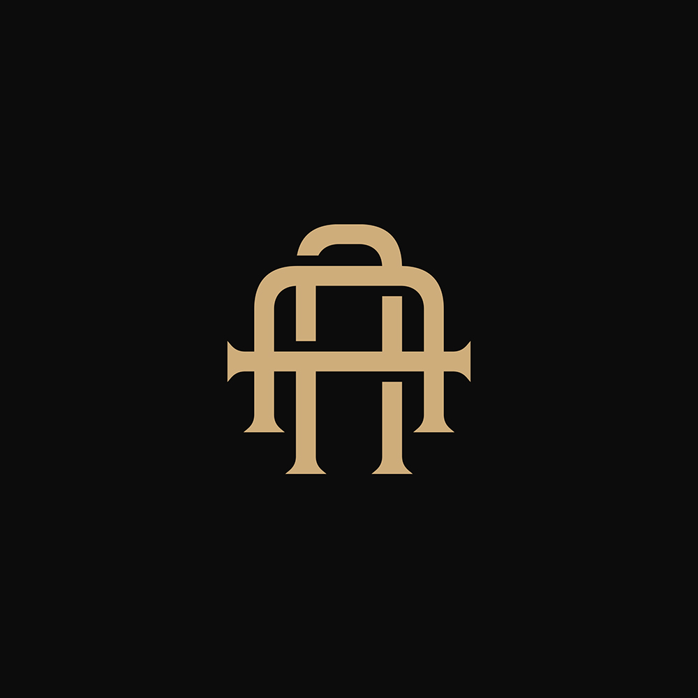 2 Gold Letter A on black background logo